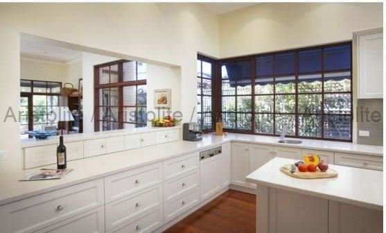 L Shaped Kitchen Design by Aristolite with modern finishes