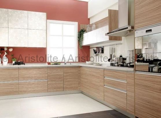L Shaped Kitchen Design by Aristolite with modern finishes