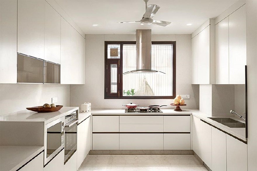 Parallel kitchen designs with modern modular cabinets and lighting